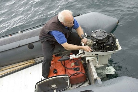 Engineer_person_working_on_boat_engine