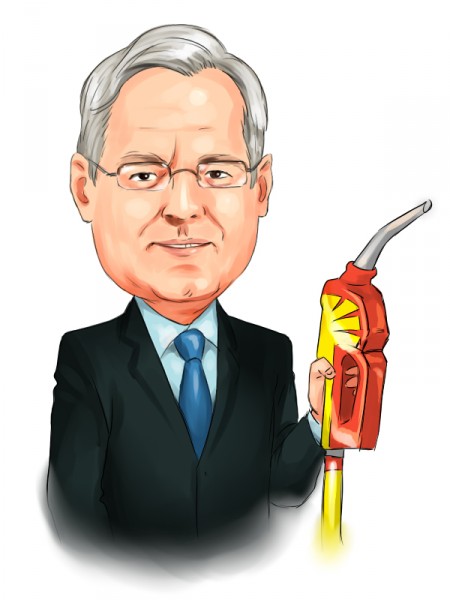 Peter Voser holding pump