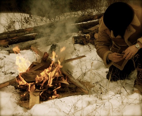 mountain-man-campfire in the snow