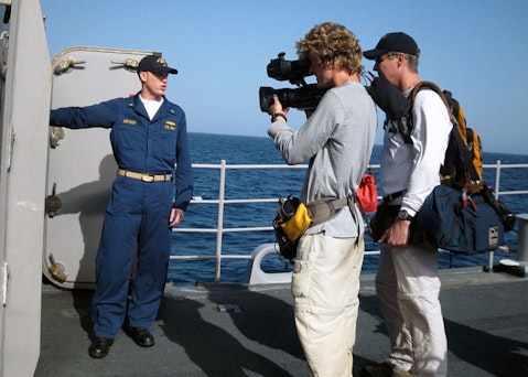 US_Navy_090321-N-7569G-001_Lt._j.g._Matthew_Dryden_leads_a_Discovery_Channel_film_crew_on_a_tour_of_the_guided-missile_cruiser_USS_Vicksburg_(CG_69)_for_the_three-part_series