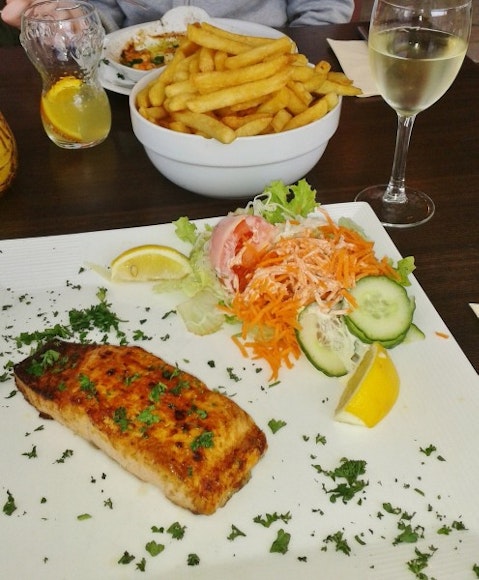 Spain fish dinner with wine