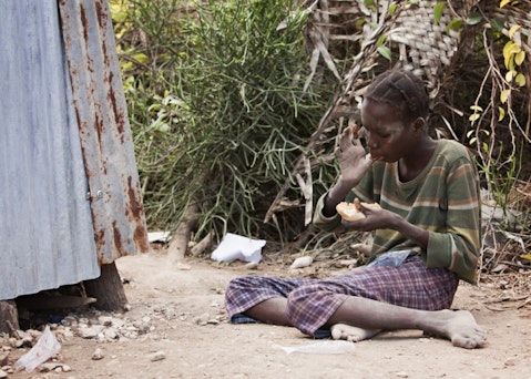 poor, haiti, impoverished, destitute, dirty, charity, butter, missionary, sitting, starvation, outside, peanut, malnourished, starving, poverty, young, girl, nourish, malnutrition, dirt, outdoors, ngo, kid, peanutbutter, bread, protein, nourishment, litter, hungry, haitian, 10 Most Corrupt Countries in The World in 2015