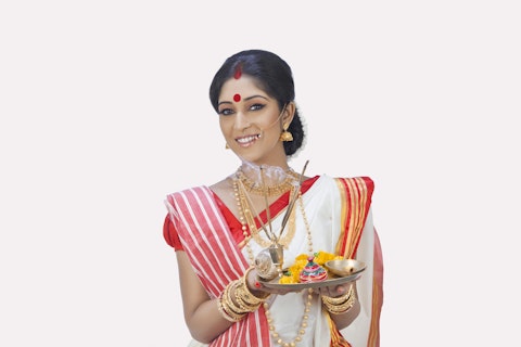Indian Woman Portrait of Bengali woman with puja thali Hinduism Hindu