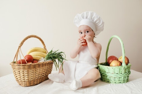 Most Common Food Allergies In Infants baby eating vegetable