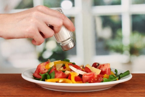 salt, shaker, adding, salad, dinner, seasoning, hand, sodium, cafe, table, paprika, steel, spice, plate, kitchen, green, white, red, yellow, bright, dishware, condiment,