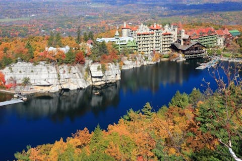mohonk, mountain, leaves, ripples, destination, strata, rocks, autumn, travel, preserve, trees, rowboat, lake, people, sandstone, dock, shawangunk, fall, colorful, house, boat, cliff, resort, hotel, gazebo, reflections, upstate New York,The 11 Best Places to Stay in Upstate New York