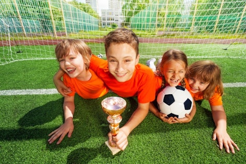 sport, child, gate, many, fun, park, green, row, boy, ball, arm, grass, goblet, football, group, childhood, uniform, game, net, prize, field, win, laying, lay, cup, active, summer, 20 Easiest Debate Topics for Middle School 