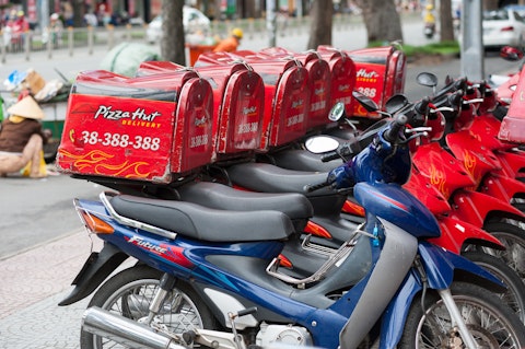 street, delivery, nobody, perspective, row, motorcycles, red, day, sign, line, hcmc, parking, letter, hochiminh, editorial, hut, box, lot, pizza, trademark, saigon, english,