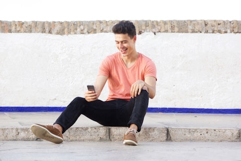 adult, alone, attractive, boy, call, carefree, casual, caucasian, cell, cellphone, chat, cheerful, cool, enjoy, expression, face, fashion, guy, handsome, happy, hispanic, holding, latin, laughing, lifestyles, looking, man, mobile, model, modern, one, outdoors, outside, person, phone, portrait, reading, relax, sidewalk, sit, smart, smiling, street, technology, telephone, text, white, wireless, young, youth