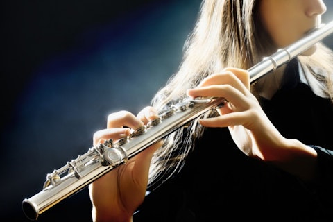 shutterstock_120133780 Flute music playing flutist musician performer with bright musical instrument acoustic, art, artist, artistic, background, beautiful, blow, bright, classic, classical, classical instruments, classical music, classical musicians, close, close-up, closeup, concert, details, entertainment, female, flautist, flute, flute instrument, flute music, flutist, girl, hand, inspiration, instrument, music, musical, musical instrument, musician, orchestra, performance, performer, play, player, pretty, professional, sound, studio, symphonic, symphony, up, wind, winder, woman, woodwind, young