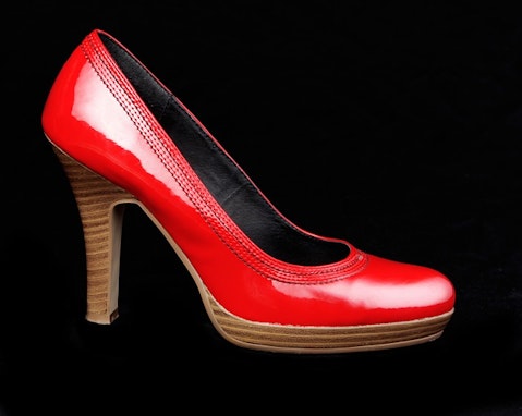 Red stiletto in black background