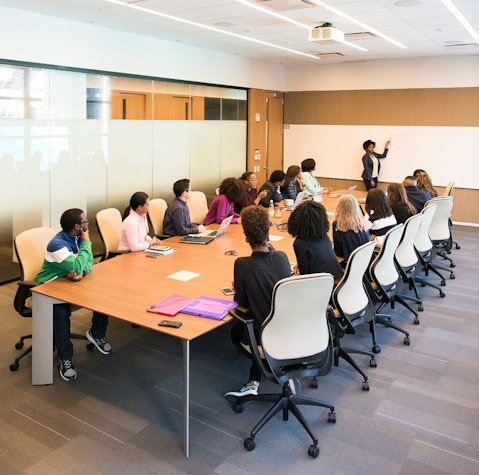 Employee Training people having meeting inside conference room