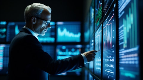 A corporate finance professional studying a financial performance chart.