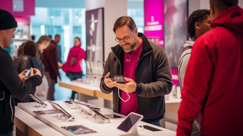 A customer checking out their new device at a T-Mobile store, illustrating the convenience and accessibility of retail stores.