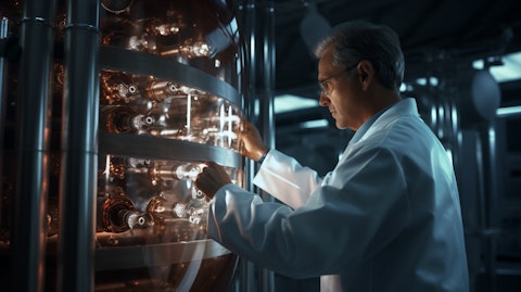 A scientist in a lab coat inspecting a cylinder filled with industrial gas.