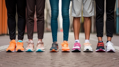 A team of trainers and athletes displaying a wide range of athletic and casual footwear.