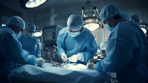 A medical team performing minimally invasive surgery with a da Vinci Surgical System.