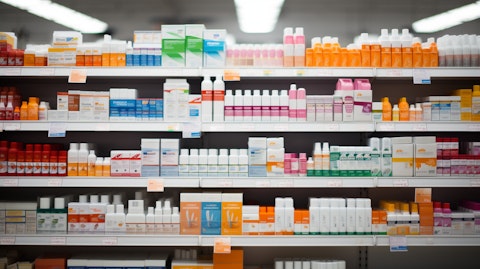 A row of shelves in a retail pharmacy, demonstrating the variety of drugs and over-the-counter products.
