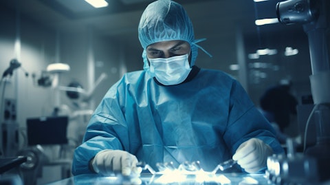 A surgeon in a modern operating room holding advanced medical devices with a sense of purpose and accuracy.