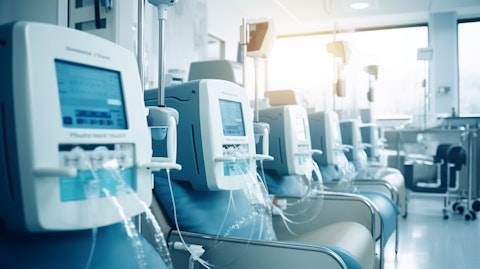 Patients connected to dialysis machines in a hospital ward, highlighting the company's dialysis and intravenous therapies.