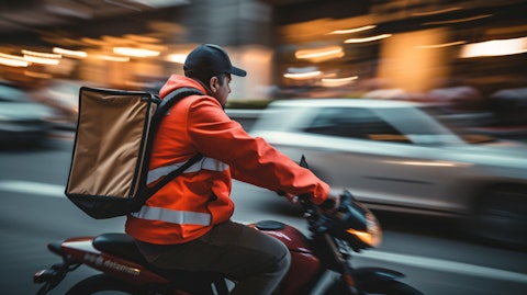 A shot of a delivery driver zooming down a busy street, symbolizing the company's quick and efficient delivery services.