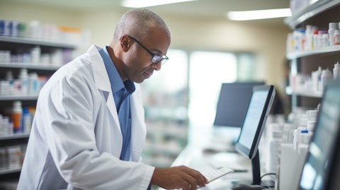 A pharmacist filling a prescription for a complex drug developed by the company.