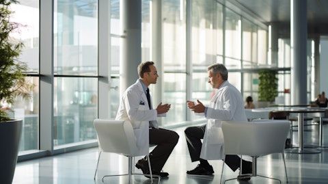 A physician and a patient having a discussion in a hospital about biopharmaceutical medicines.