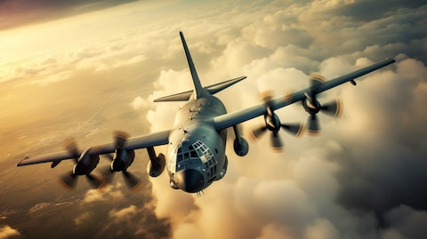 A military aircraft in flight, showing the strength of the company's combat & air mobility capability.