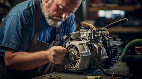 A technician in a mechanic's uniform replacing an A/C compressor, signifying the company's automotive replacement parts business.