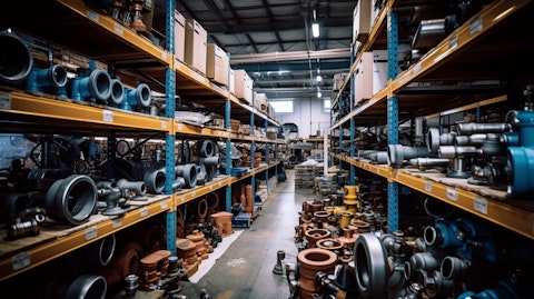 A busy warehouse stocked with a variety of industrial plumbing parts.