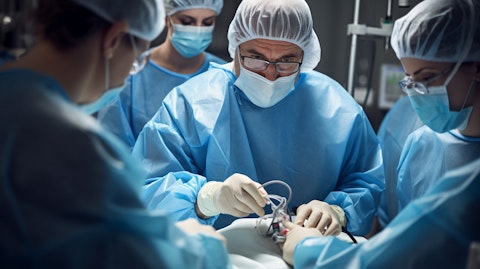 A skilled surgeon surrounded by a team of medical professionals performing a Transcatheter Heart Valve Replacement.