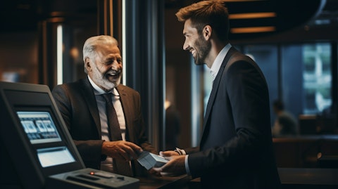 A friendly representative helping a customer with setting up a bank account.