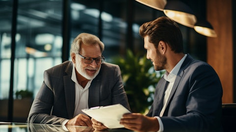 An experienced financial advisor discussing investment options with a client.