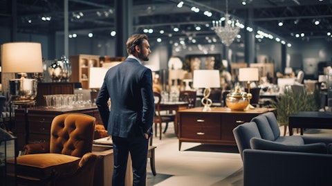 A customer happily browsing aisles of high-end furniture in a large showroom.