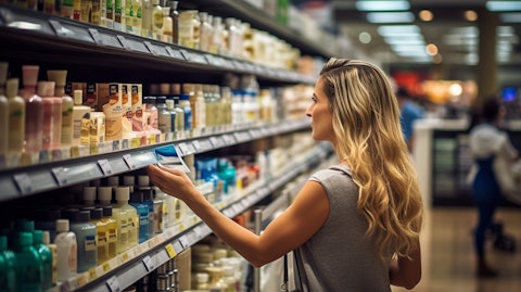 A female customer browsing a variety of body care products in a retail store.