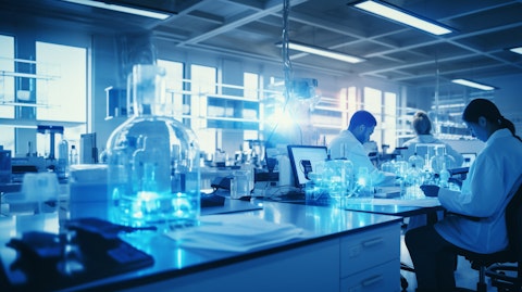 A lab setting filled with scientific equipment and researchers in lab coats working together to develop new therapies for autoimmune diseases.