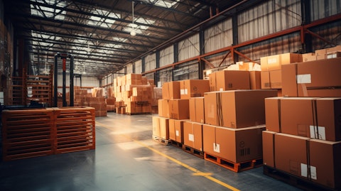 A warehouse filled with boxes of parcels, symbolizing the companies reliable logistics services.