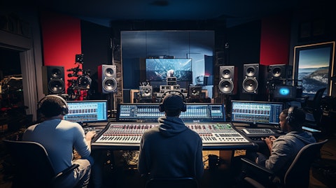 A team of record producers and musicians in the studio, their creative process on full display.