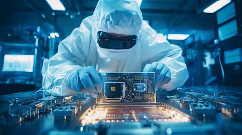 A technician in a lab coat calibrating advanced electronic components.