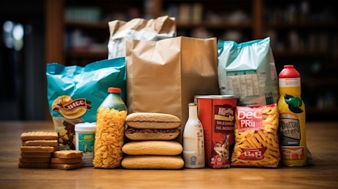 A stack of grocery bags filled with ready-to-eat cereals, frozen waffles, and savory snacks.