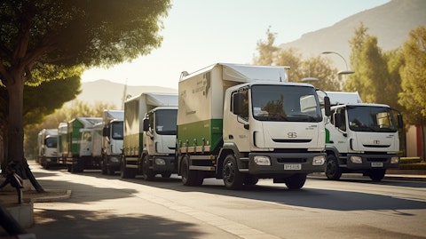 A fleet of trucks carrying recyclable materials, highlighting the company's transfer services.