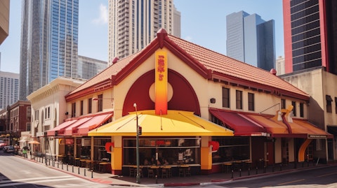 The iconic yellow and red roof of a franchise restaurant in the bustling streets of a city.