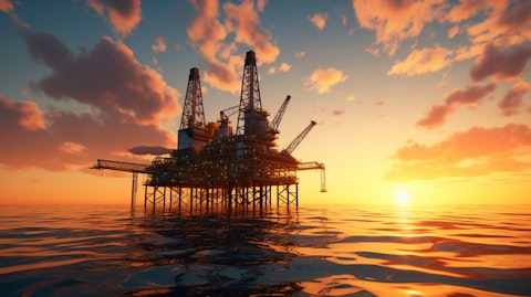 A vast oil rig pumping crude oil during a sunset, emphasizing the company's focus on oil & gas exploration and production.