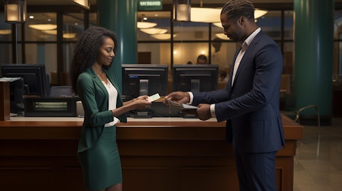 A banker handing a certificate of deposit to a customer in a bank branch.