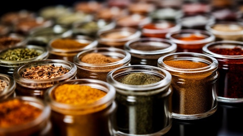 A close-up of spices, herbs and seasoning mixes in a colorful array, highlighting the company's range of products.