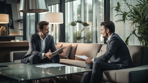 An insurance broker talking to a client, demonstrating the trust of their services.
