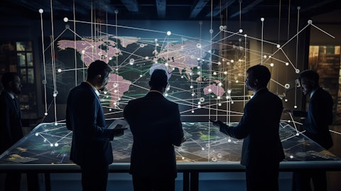 A team of telecom engineers discussing a communication infrastructure diagram.
