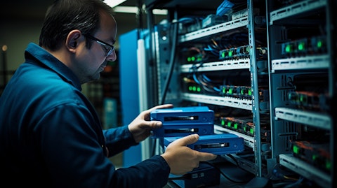 A technician configuring a network-attached storage drive.