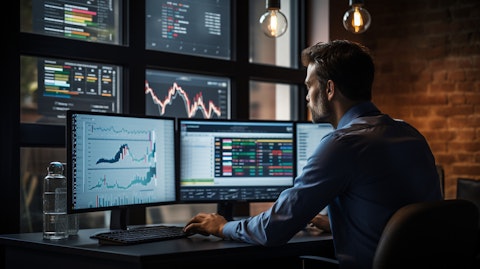 A business operations manager, looking over the expense management system that helps simplifies the financials for the company.
