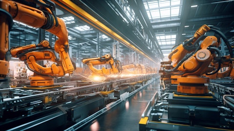 A modern industrial equipment assembly line in motion.